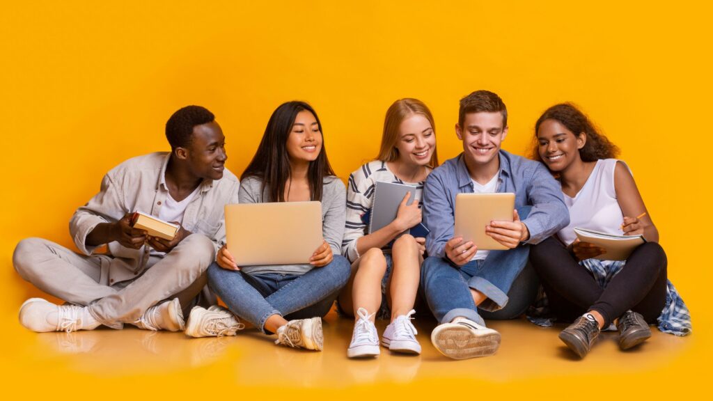 young people using laptops